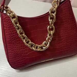 Dark red purse